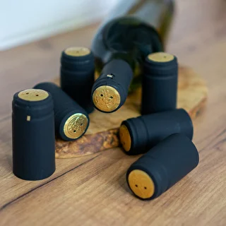 Kryty s perforáciou čierne fi31mm 100ks. – photo 2