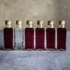 Fľaša Flora 100 ml so skrutkovacím uzáverom fi28, 8 ks. - 8 ['fľaša na likér', ' fľaše na likér', ' fľaša na alkohol', ' ozdobné fľaše na alkohol', ' sklenená fľaša na alkohol', ' fľaše na pálenku na svadbu', ' fľaša na likér', ' ozdobné fľaše', ' fľaša na vodku', ' fľaša na vodku.']