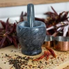 Mramorový kuchynský mažiar, čierny, fi 10,5 cm - 11 ['mažiar', ' mažiar s tĺčikom', ' mramorový mažiar', ' kamenný mažiar', ' mažiar z kameňa', ' kuchynský mažiar', ' mažiar na bylinky', ' mažiar z mramoru', ' ozdobný mažiar', ' kuchynský mažiar', ' mažiar na bylinky', ' mažiar na korenie', ' elegantný mažiar', ' pekný mažiar']